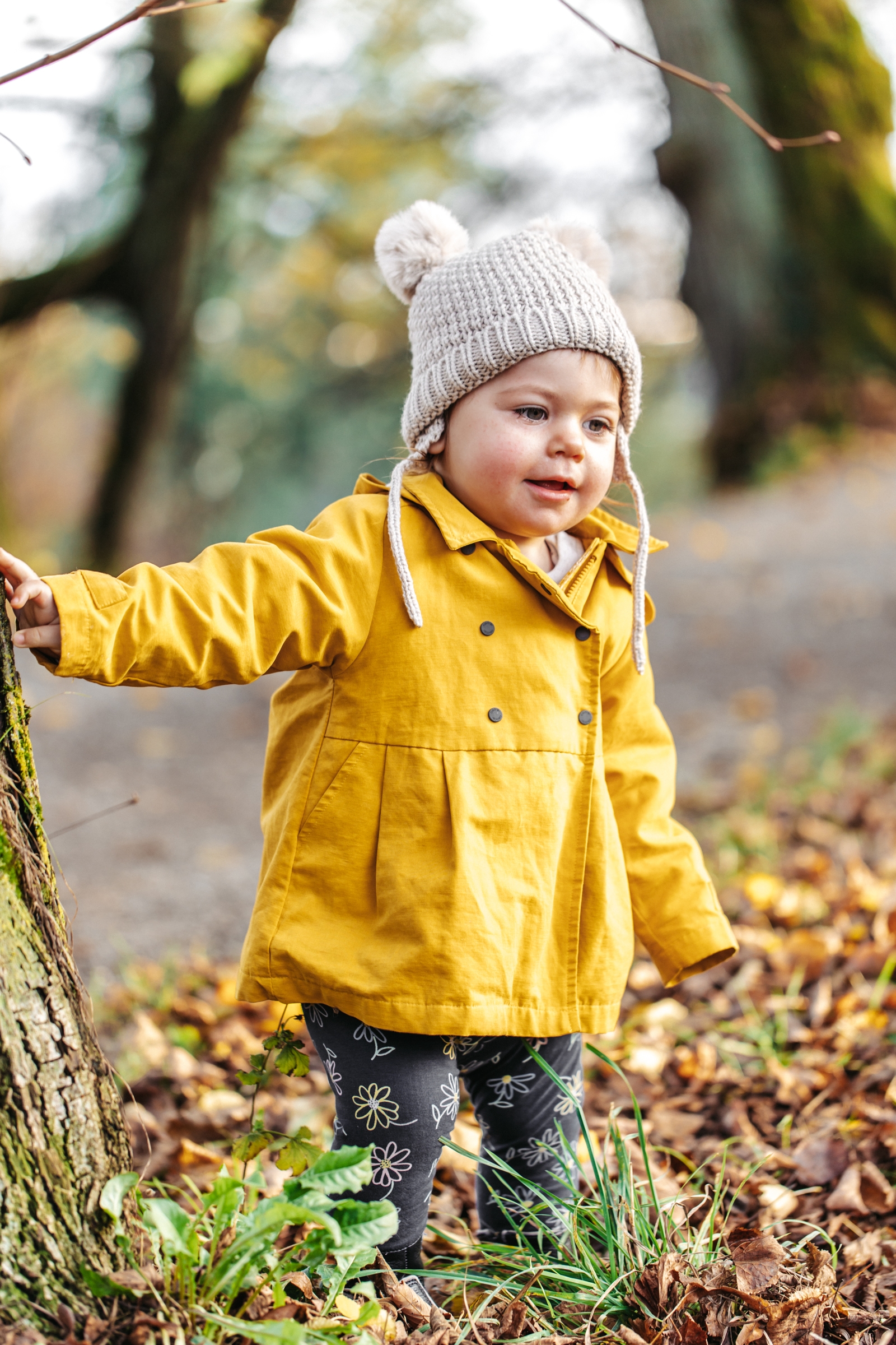 child park yellow raincoat